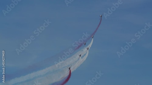 Air show aerobatic team Turkish Stars (Türk Yıldızları) on a demonstration flight at the well-known tourism region Fethiye Çalışlar Beach. Muğla - Turkey

