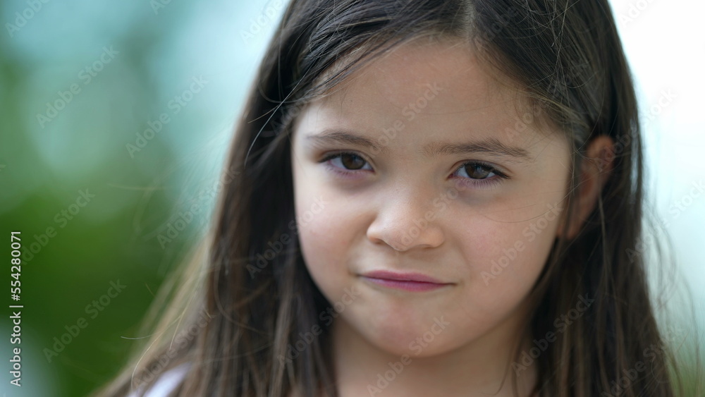 Cute little girl portrait pensive child closeup standing outside Cute little girl portrait pensive child closeup standing outside