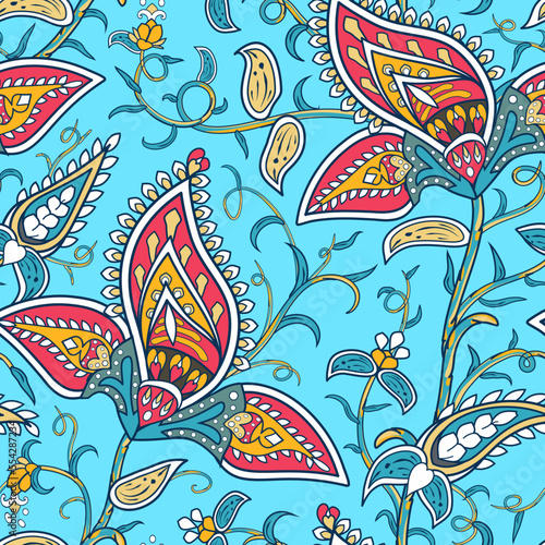 Seamless paisley pattern with folk tropical flowers. Indian stylized floral texture for carnival textile or wrap. Festival oriental style using boteh or buta