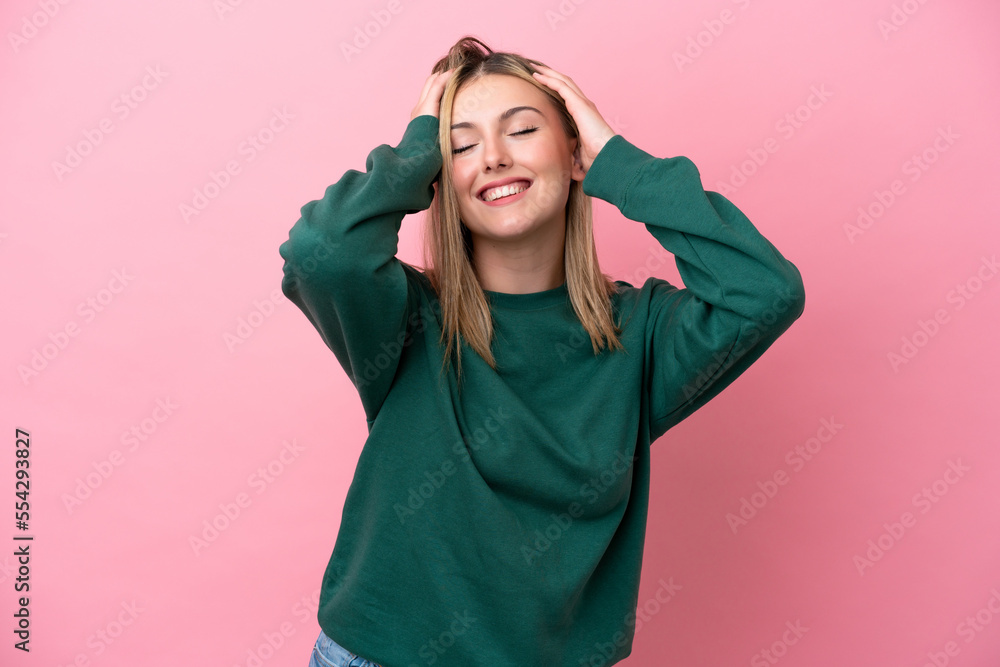 Young caucasian woman isolated on pink background laughing Young caucasian woman isolated on pink background laughing