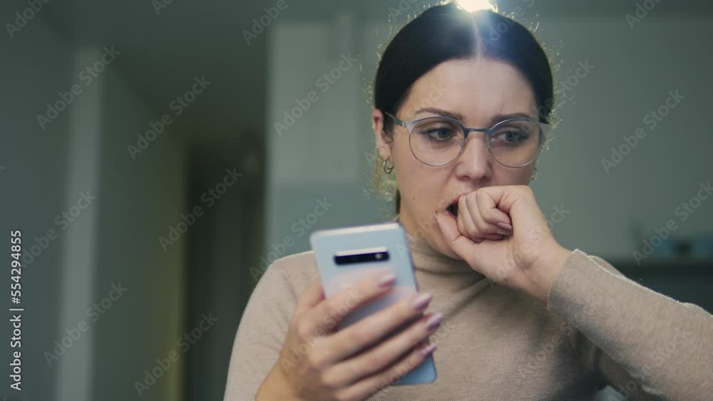 Serious woman receiving letter from foreign partners, problems with business Serious woman receiving letter from foreign partners, problems with business