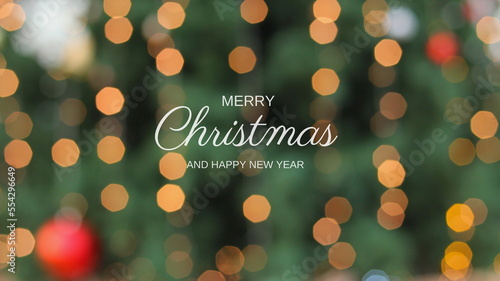 Golden merry christmas text with bokeh lights in the background