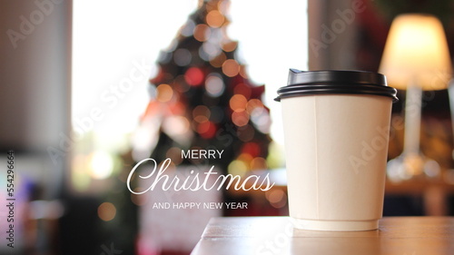 Golden merry christmas text with bokeh lights in the background