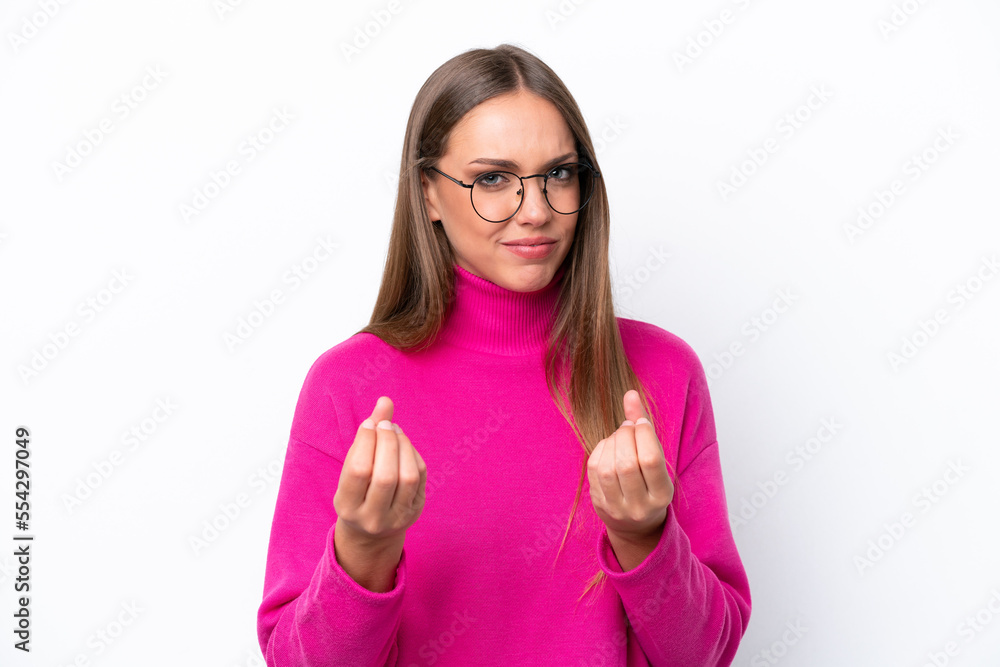 Young caucasian woman isolated on white background making money gesture but is ruined Young caucasian woman isolated on white background making money gesture but is ruined