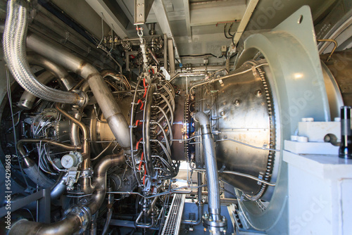 Gas turbine engine at an electricity cogeneration plant
