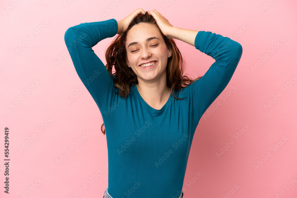 Young caucasian woman isolated on pink background laughing Young caucasian woman isolated on pink background laughing
