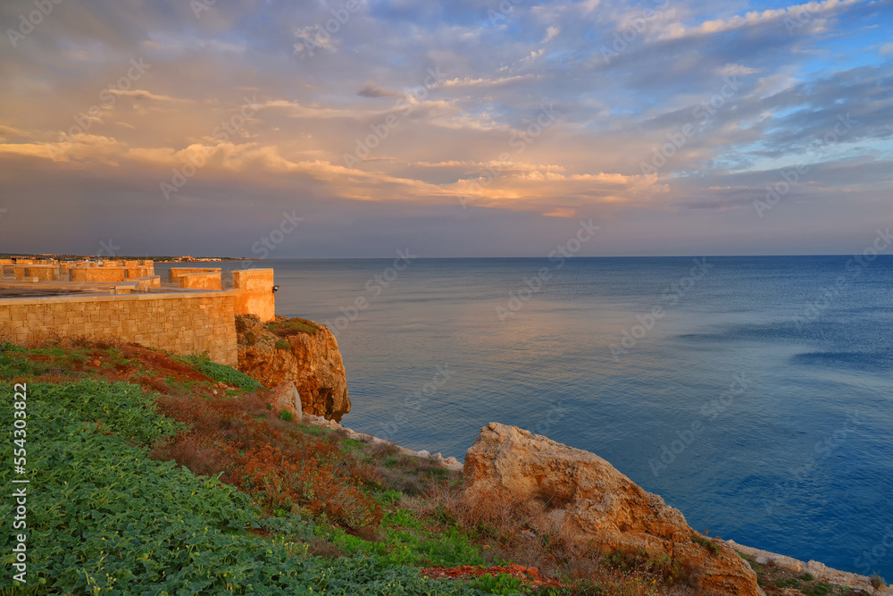 Sunrise colours over Polignano a Mare resort in Puglia, Italy, Europe
