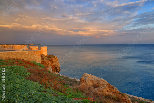 Sunrise colours over Polignano a Mare resort in Puglia  Italy  Europe 
