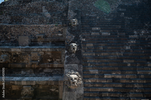 Ruins of stairs with snake head in the stairs from Teotihuacan in Mexico photo