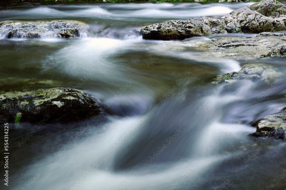 Water cascading over rocks in the Little River in springtime.; Little River, Great Smoky Mountains National Park, Tennessee. Water cascading over rocks in the Little River in springtime.; Little River, Great Smoky Mountains National Park, Tennessee.
