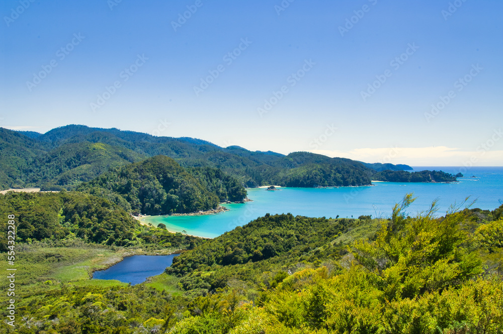 View of the coast of Abel Tasman National Park, South Island, New Zealand. from the Abel Tasman Coast Track between Marahau and the bay The Anchorage.

