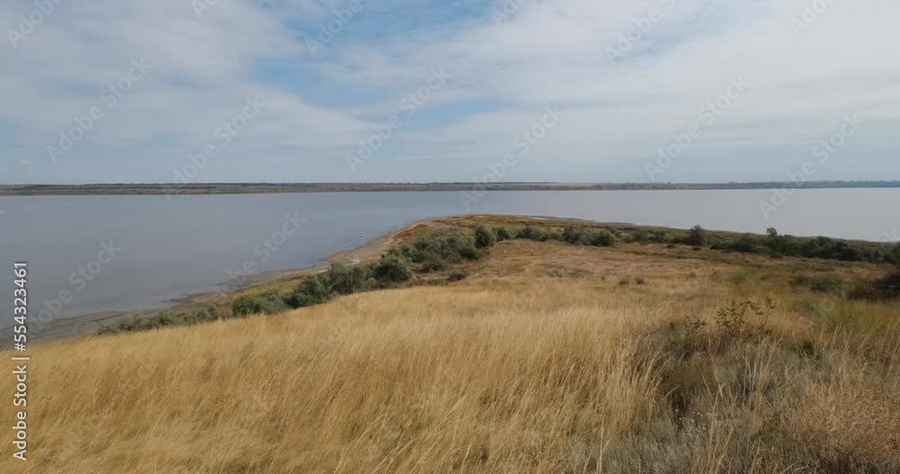 Landscape of the autumn steppe near the estuary in Ukraine Landscape of the autumn steppe near the estuary in Ukraine