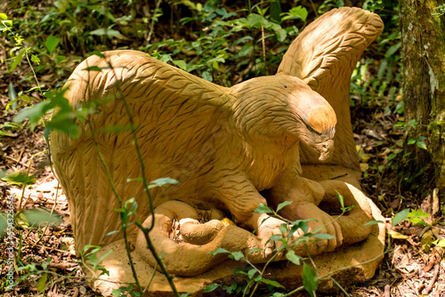 stone statue of an eagle  sculpture garden in Brazil.