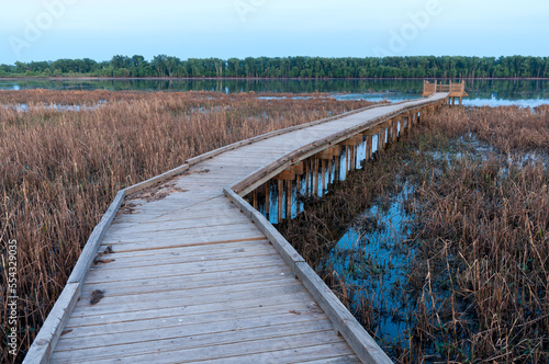 marsh and boardwalk along minnesota river in minnesota valley national wildlife refuge of bloomington minnesota