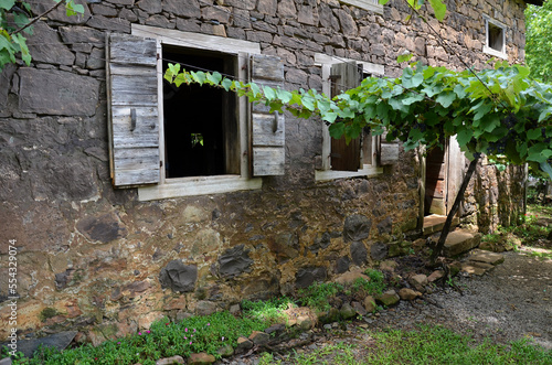 Old stone Italian house from 1880 photo