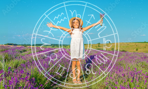 A child in a lavender field. zodiac sign. Selective focus. © yanadjan
