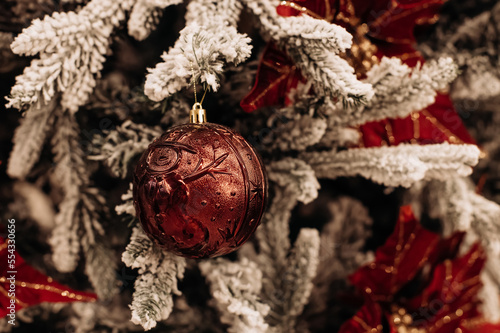 red christmas ball on a tree