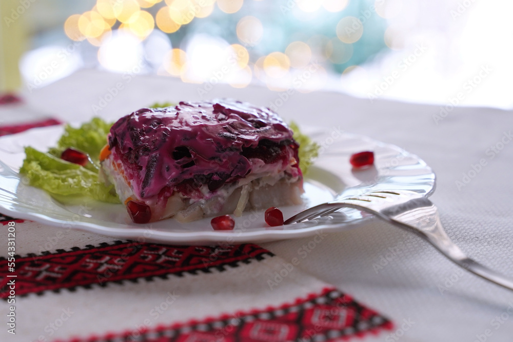 Dressed herring aka herring under a fur coat salad. Traditional Ukrainian food.
