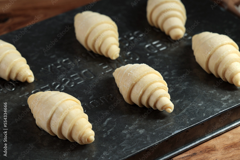 Frozen Croissants on a Baking Dish in the Kitchen Frozen Croissants on a Baking Dish in the Kitchen