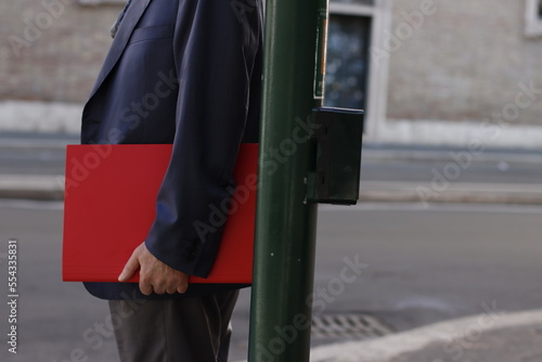 Man with a red book