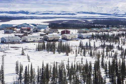 New housing in village of Kiana, Alaska, in winter; Kiana, Alaska, United States of America photo