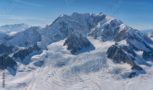 Aerial photo of Kluane National Park, with snow covered mountains making up the landscape. Mount Vancouver is seen here; Haines Junction, Yukon, Canada photo