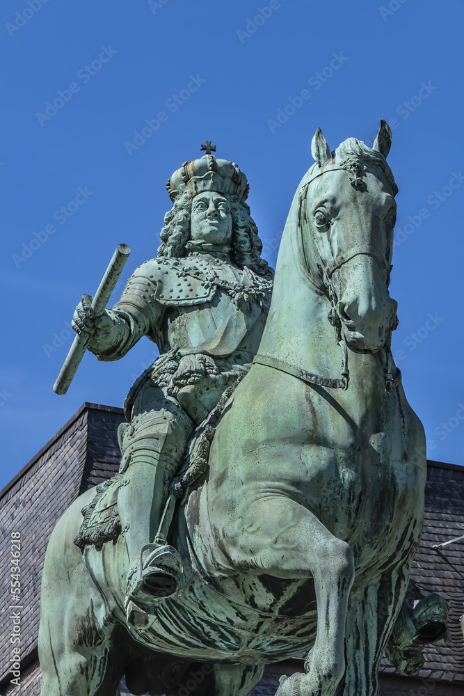 Jan Wellem equestrian monument (1711) in front of Dusseldorf Town Hall (Altes Rathaus) at the Market square. Monument shows Jan Wellem dressed in full armor. DUSSELDORF, GERMANY. Jan Wellem equestrian monument (1711) in front of Dusseldorf Town Hall (Altes Rathaus) at the Market square. Monument shows Jan Wellem dressed in full armor. DUSSELDORF, GERMANY.