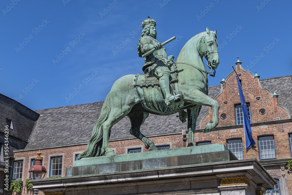 Jan Wellem equestrian monument (1711) in front of Dusseldorf Town Hall (Altes Rathaus) at the Market square. Monument shows Jan Wellem dressed in full armor. DUSSELDORF, GERMANY.
