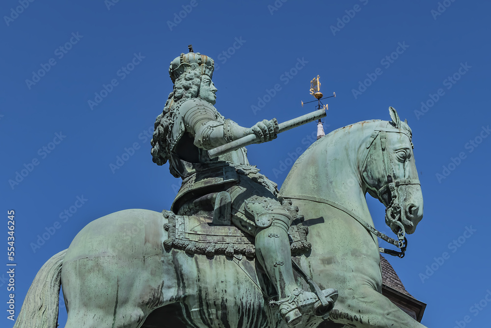 Fototapeta premium Jan Wellem equestrian monument (1711) in front of Dusseldorf Town Hall (Altes Rathaus) at the Market square. Monument shows Jan Wellem dressed in full armor. DUSSELDORF, GERMANY.