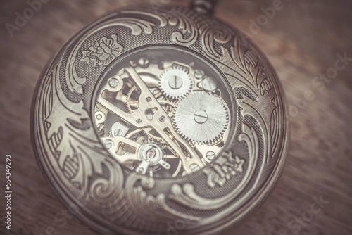 Close-up of the clockwork of a pocket watch