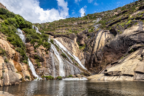 Ezaro waterfall  Galicia  Northern Spain in Spring. It empties into the Atlantic ocean in a waterfall