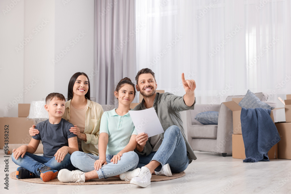 Happy family spending time in new apartment. Moving day Happy family spending time in new apartment. Moving day