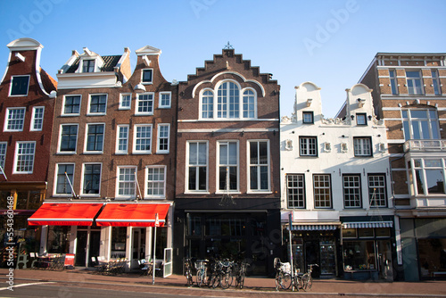 View of traditional, touristic, old Amsterdam city centre. Dutch houses.