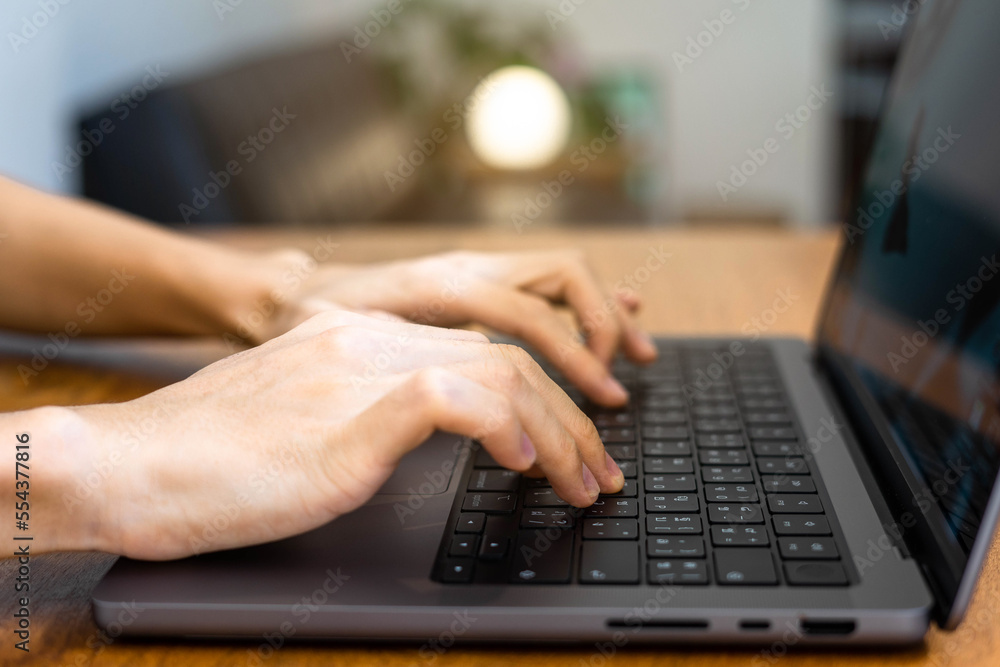 human hand image using and typing computer with circle lamp, sun light effect, laptop typing human hand image using and typing computer with circle lamp, sun light effect, laptop typing