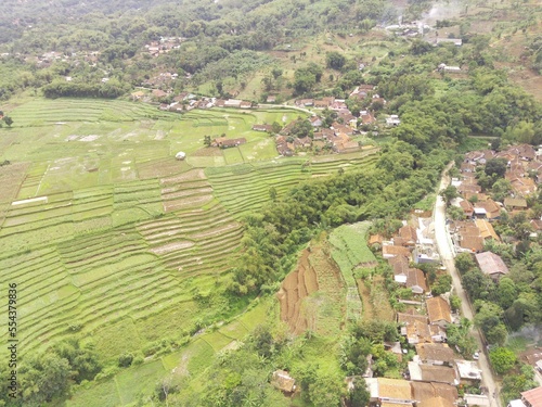 Abstract Defocused Blurred Background Aerial view of agricultural land surrounding residential areas in Cikancung - Indonesia. Not Focus