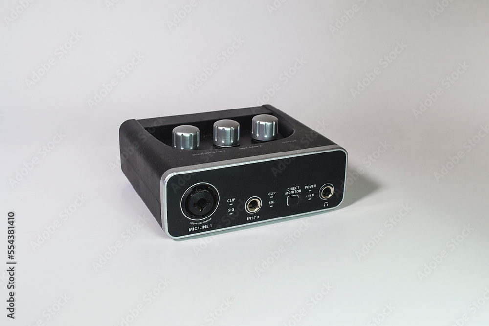 Fototapeta premium Audio interface. Electronic mini-component. portable. White background.