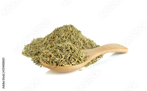 Dried rosemary leaves in wooden spoon over white background