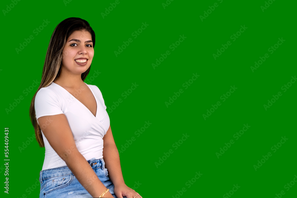 Girl on green background in promotional pose Girl on green background in promotional pose