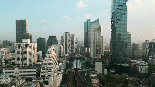 Silom Sathorn transport road car with modern office building aerial view Bangkok Thailand photo