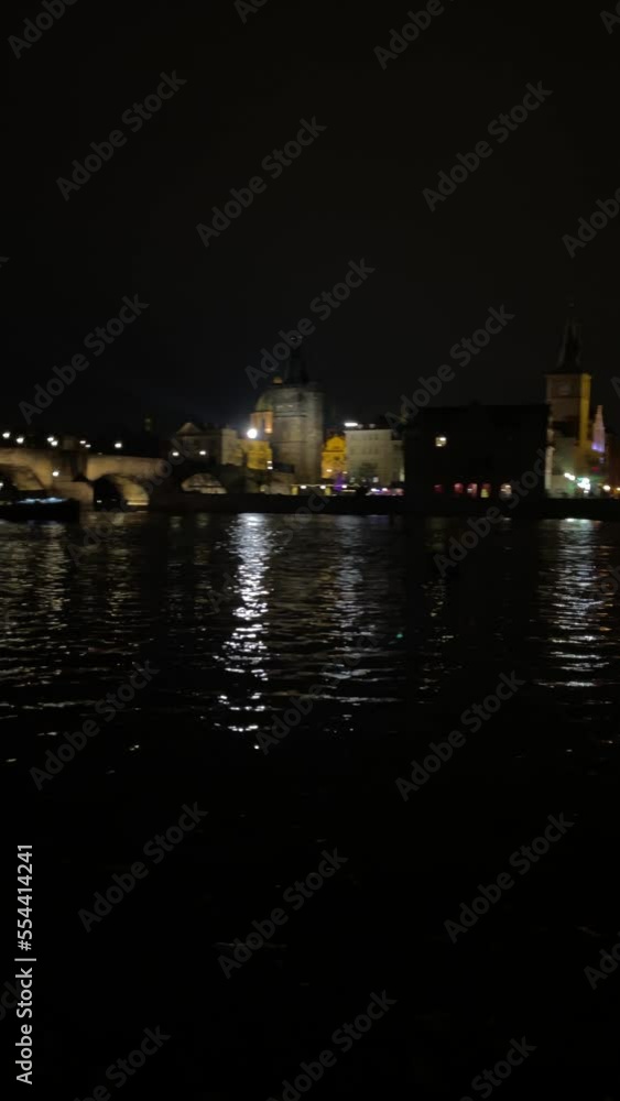 Medieval bridge illuminated at night in Prague Medieval bridge illuminated at night in Prague