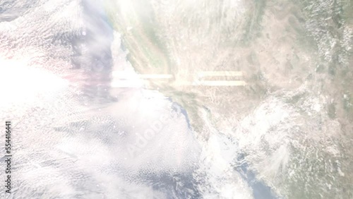 Earth zoom in from outer space to city. Zooming on Norwalk, California, USA. The animation continues by zoom out through clouds and atmosphere into space. Images from NASA