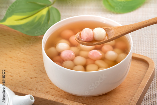 Red and white tangyuan with syrup soup.