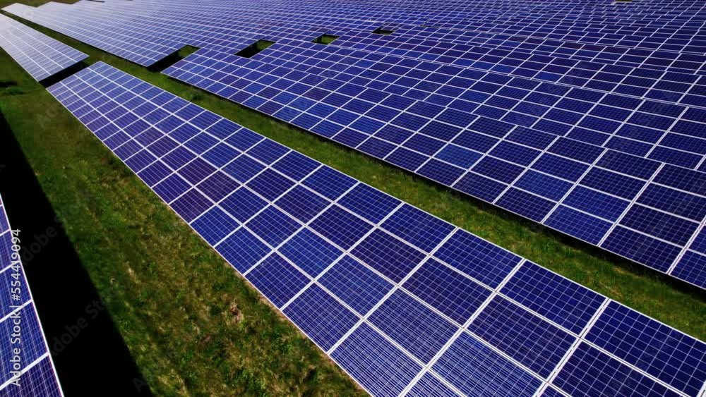 Arc Shot Of Solar Farm Harvesting Renewable Energy