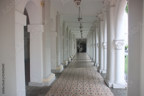 Tessellated tiled corridor in a building in Singapore.