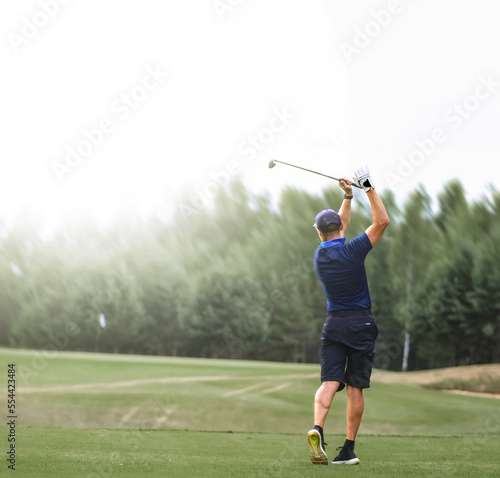 Golf at the time of impact. Golfing lifestyle. beautiful panorama