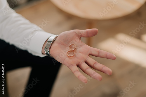 Wedding rings on groom's hand