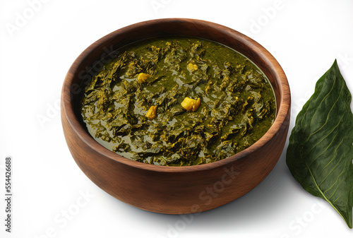 handmade curry from India Sarson ka saag ki sabji cooked with bathuva, spinach, and mustard leaves and served in a clear dish. Generative AI photo