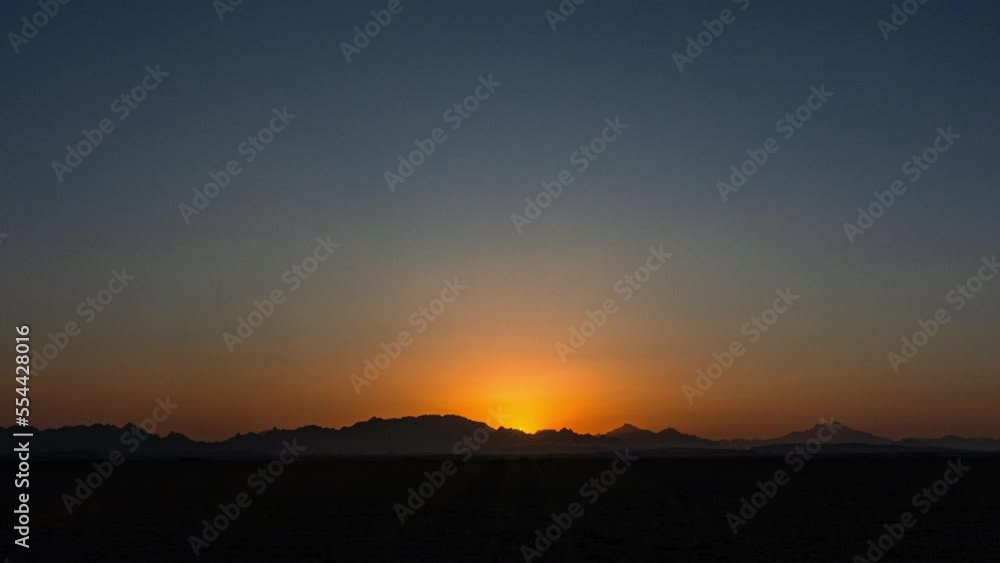 Beautiful clear big sun at sunrise or sunset against the backdrop of mountains. Africa. 4K. Time lapse Beautiful clear big sun at sunrise or sunset against the backdrop of mountains. Africa. 4K. Time lapse