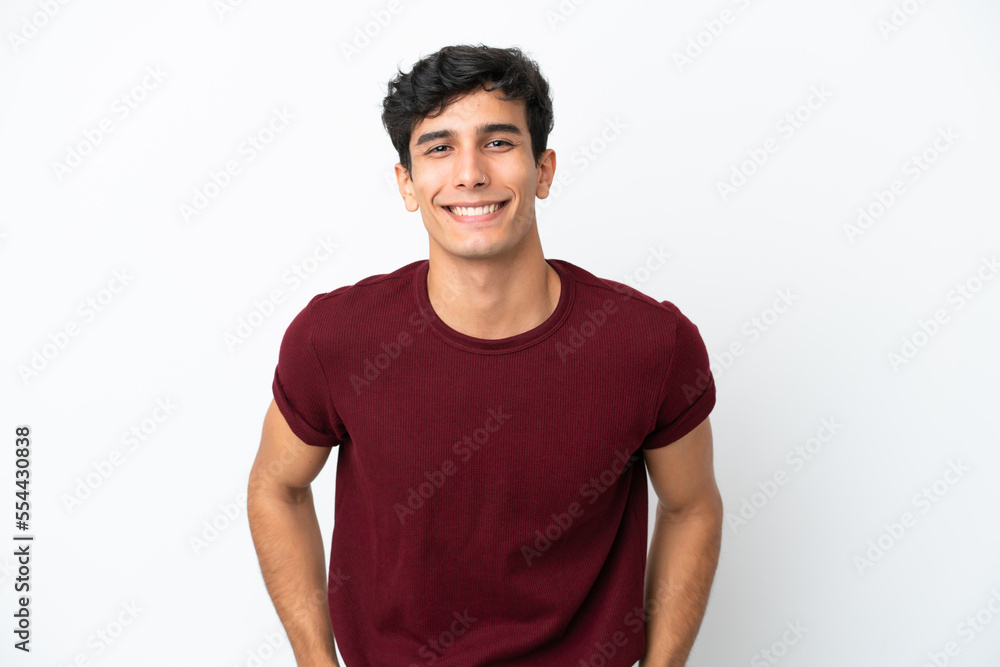 Young Argentinian man isolated on white background laughing Young Argentinian man isolated on white background laughing