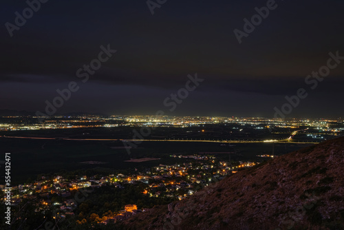 view from the mountain to the lights of the city